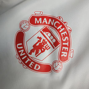 Casaco Corta Vento Manchester United 23/24 - Branca